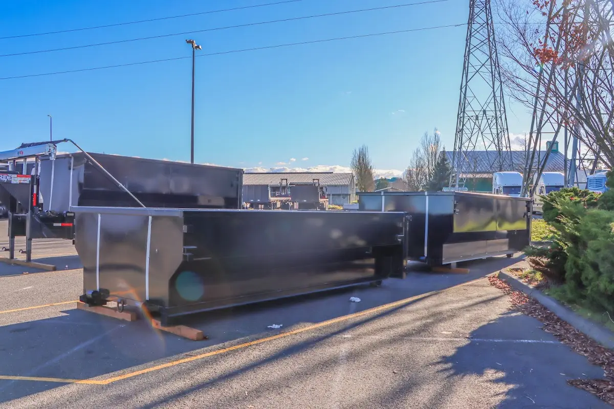 Roll-off dumpster ready for waste disposal at job site for 12 Yard Dumpster Rental in Rockville Centre